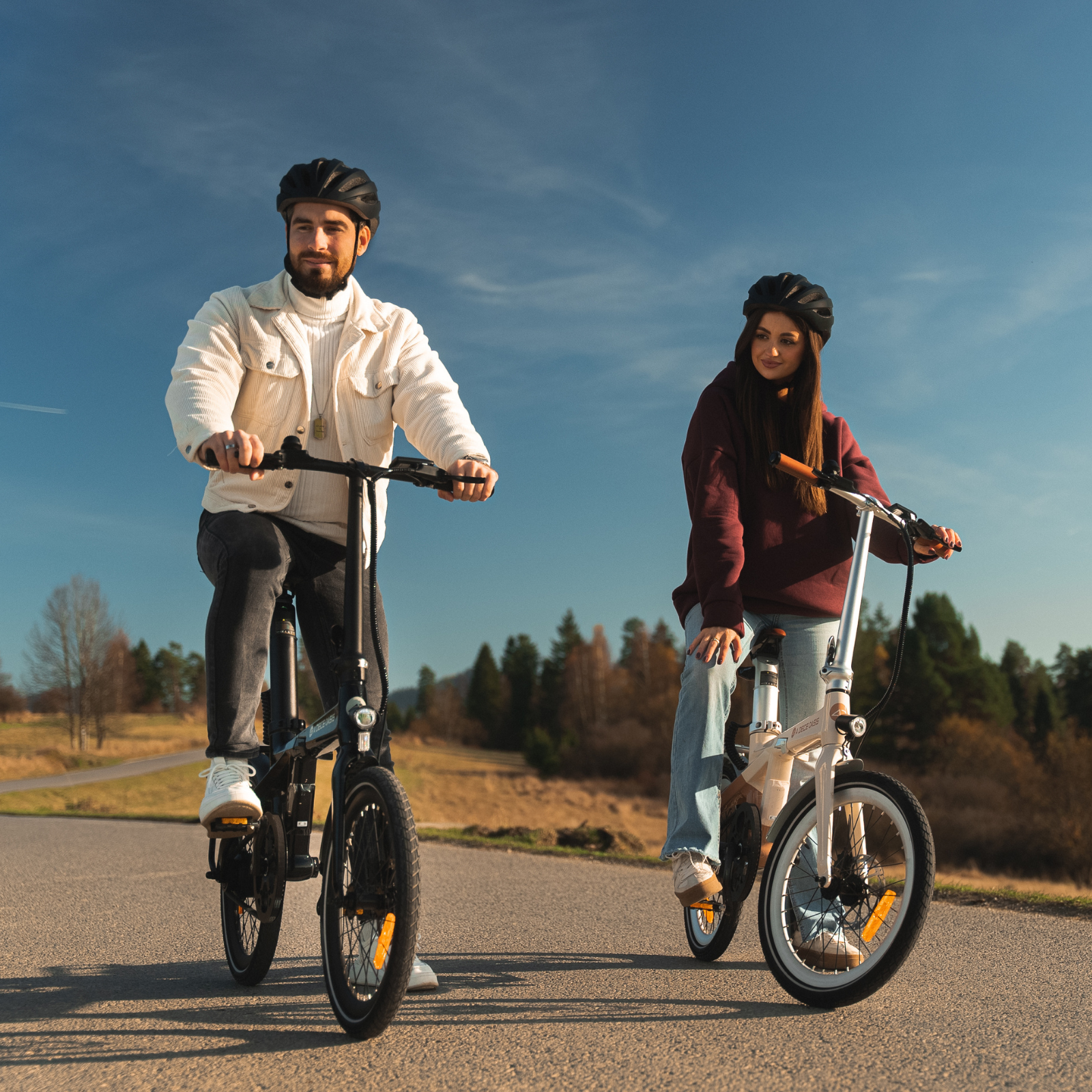 BEELDAGE ADO Air Pro combo with cream e-bike and blue foldable electric bike on white background