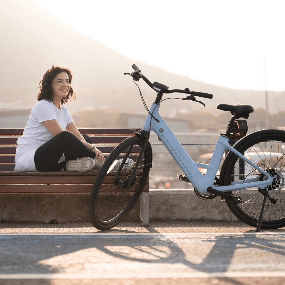 <tc>Urtopia</tc> <tc>Carbon 1</tc> Step-Thru: la bicicleta eléctrica de carbono inteligente para una movilidad cómoda.