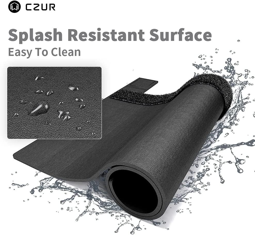 Czur black splash resistant assistive cover with water droplets showing easy to clean surface