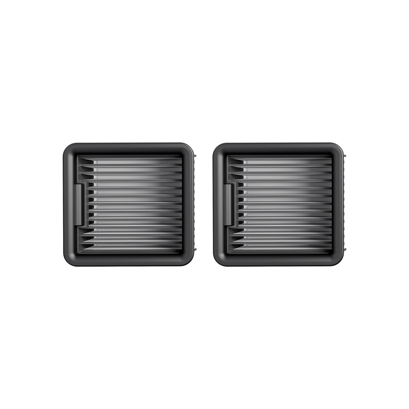 Top view of two black square air filters with parallel slats on a white background